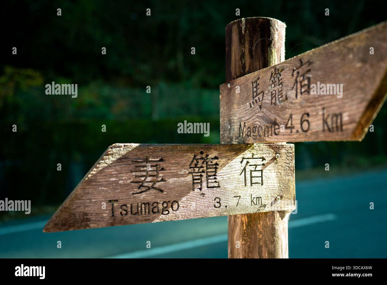 raditional wooden signpost marking the scenic Nakasendo hiking trail ...