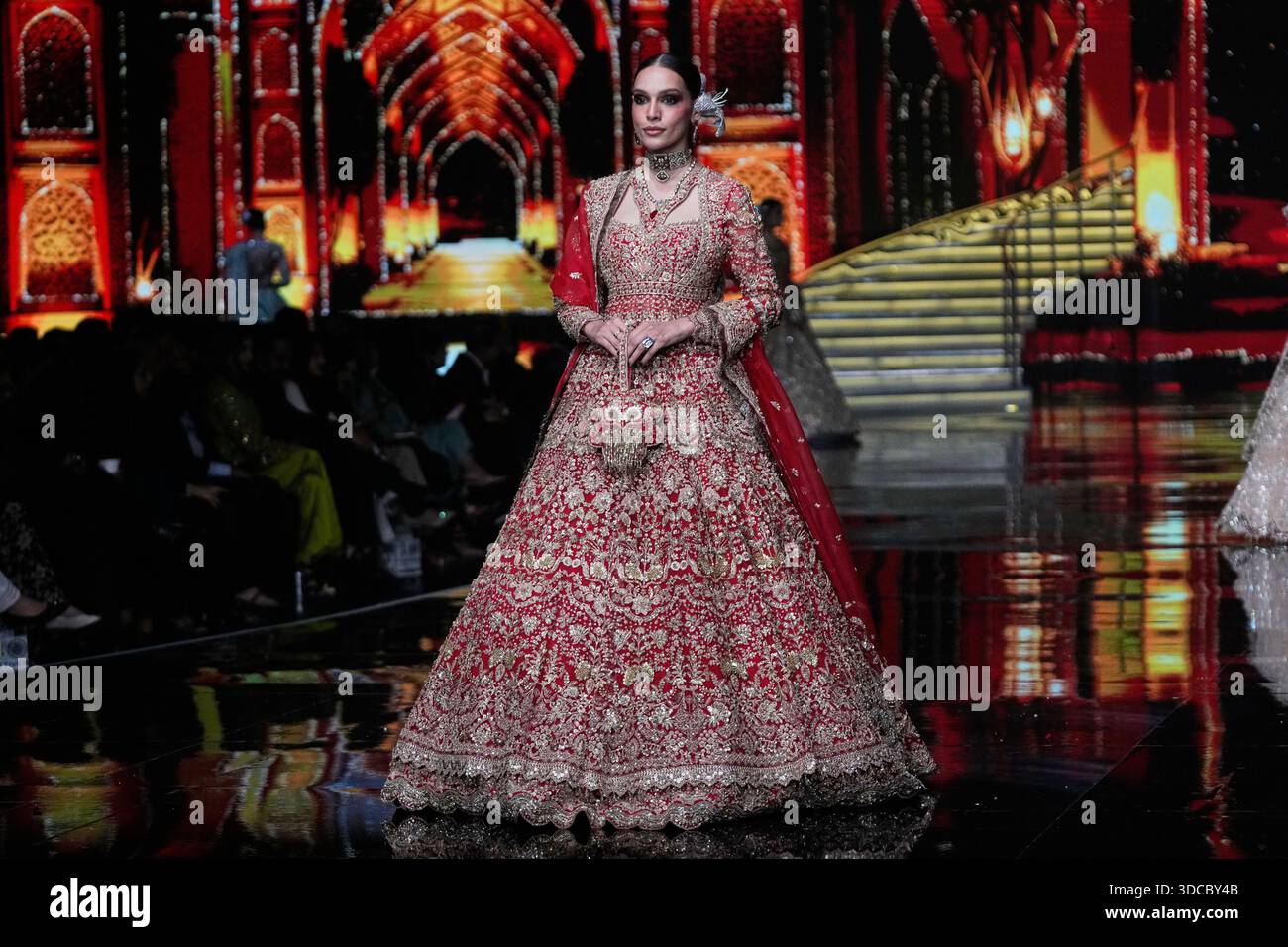 A model presents a creation from designer Akbar Aslam during the ...