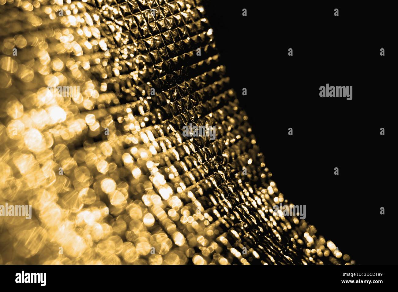 Abstract blurred golden glittering background Stock Photo