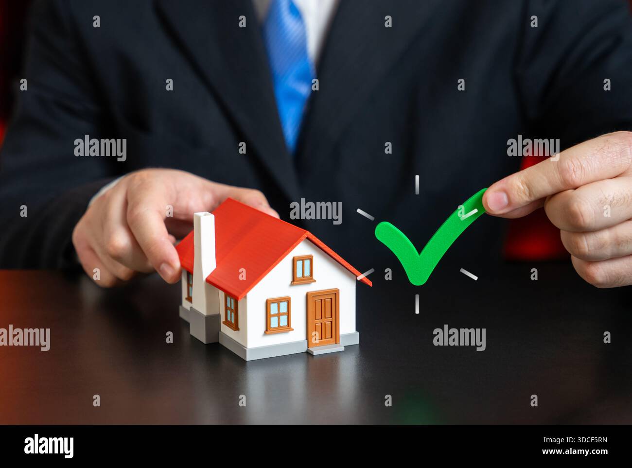 Check mark near house hi-res stock photography and images - Alamy