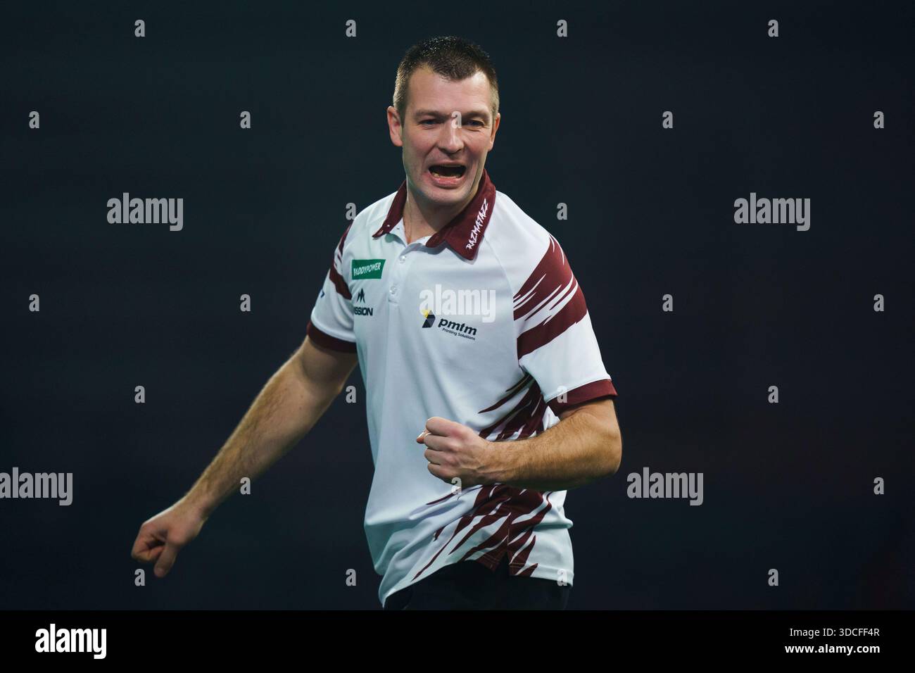 Madars Razma celebrating during the second round match between Darren ...