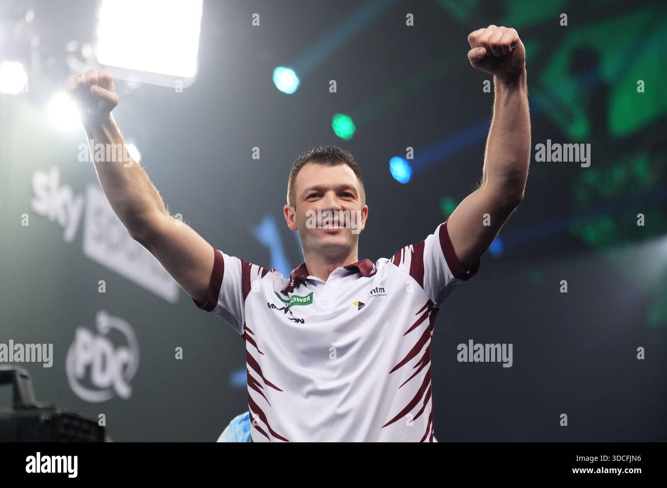 Latvia's Madars Razma celebrates defeating Scotland's Darren Beveridge ...