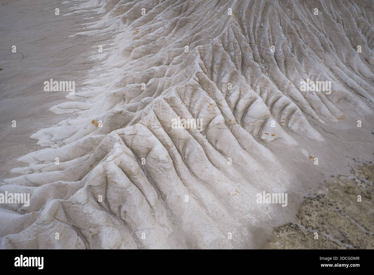 Aerial view of a stark, undulating landscape revealing intricate ...
