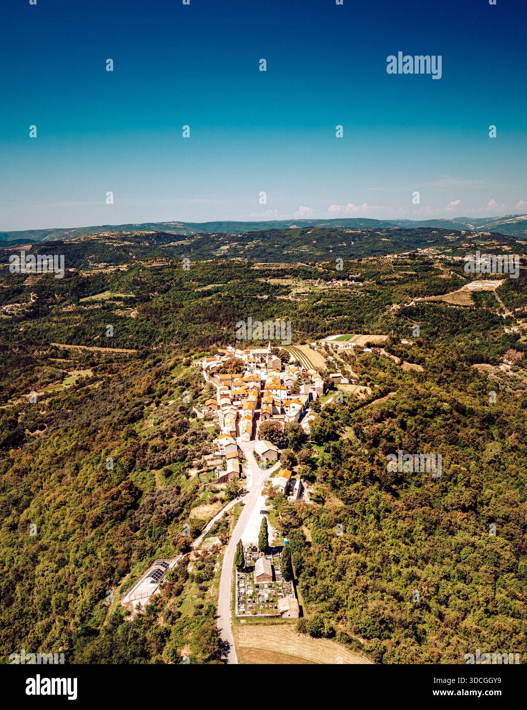 Aerial view of the charming village nestled in the rolling hills, a ...