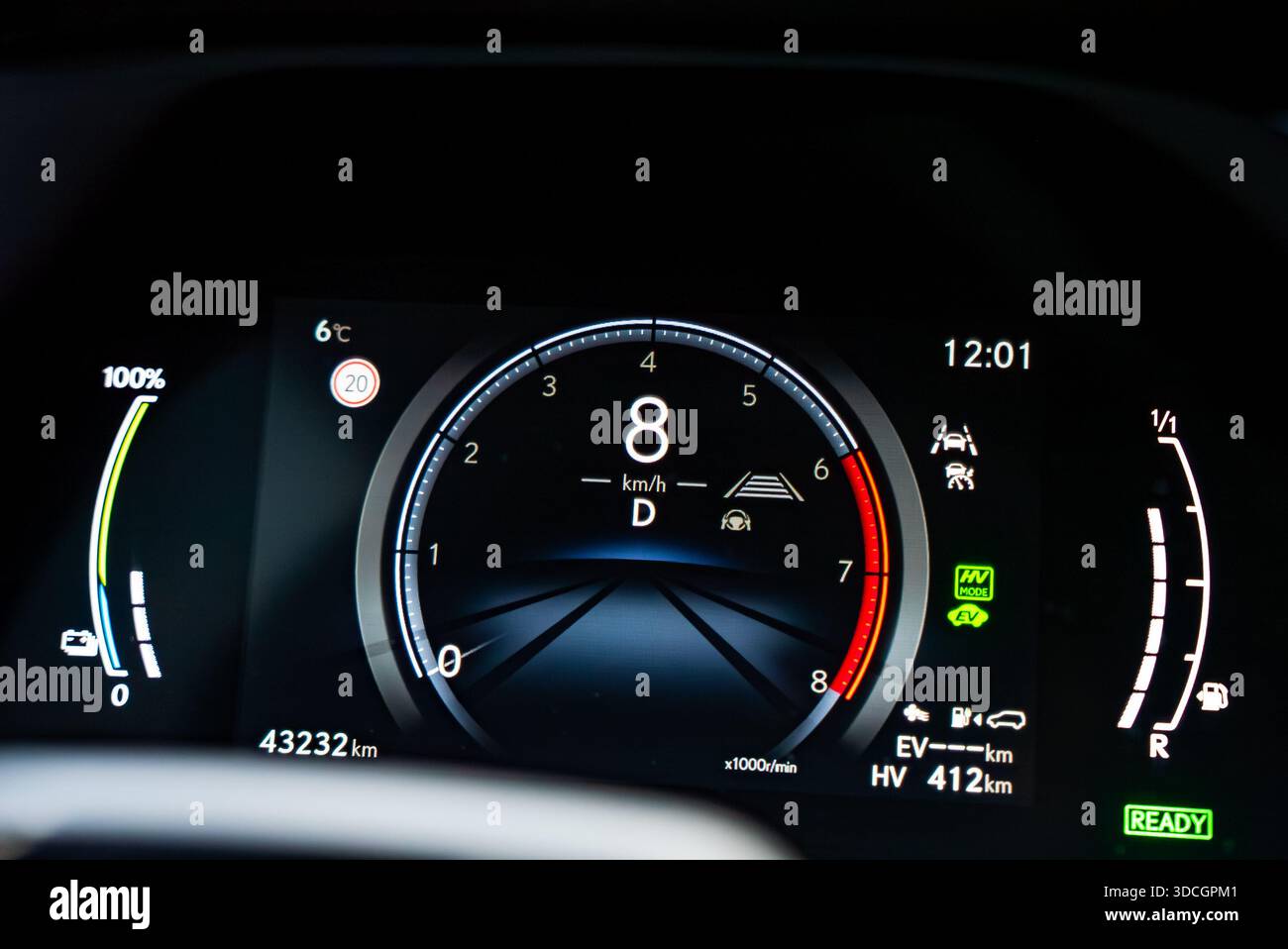 Lexus RX 450h plus digital cluster shows 8 km per h and driver