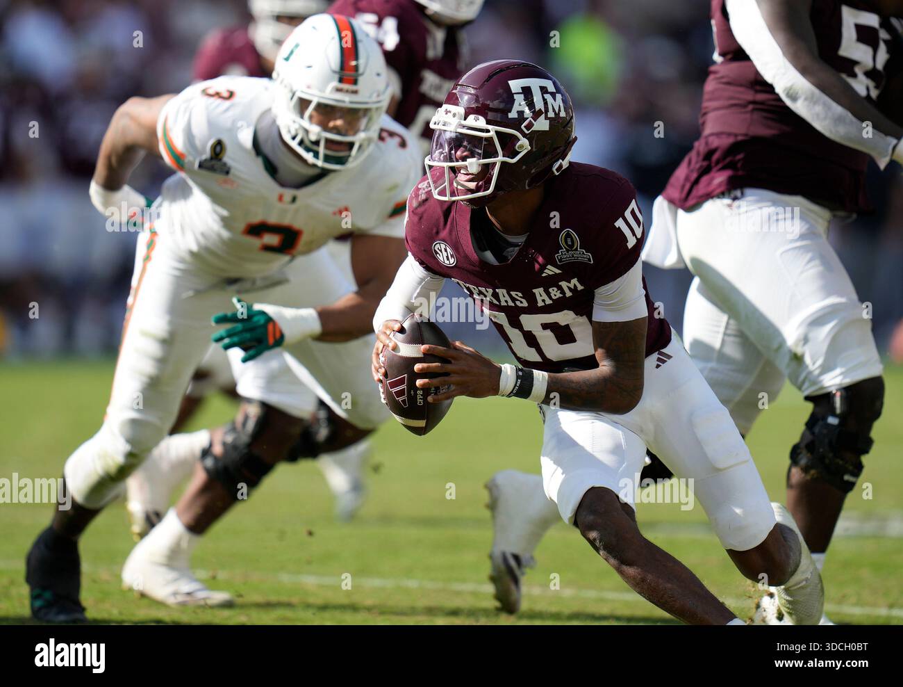 Marcel Reed Sacked Texas A&M quarterback Marcel Reed (10) scrambles before being sacked by ...