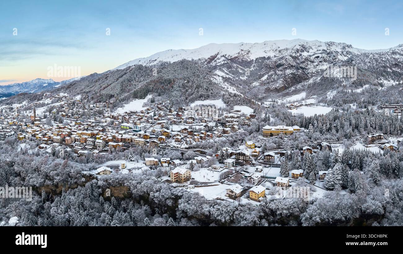 Aerial view of Castione della Presolana after a snowfall in winter. Val Seriana, Bergamo district, Lombardy, Italy. Stock Photo