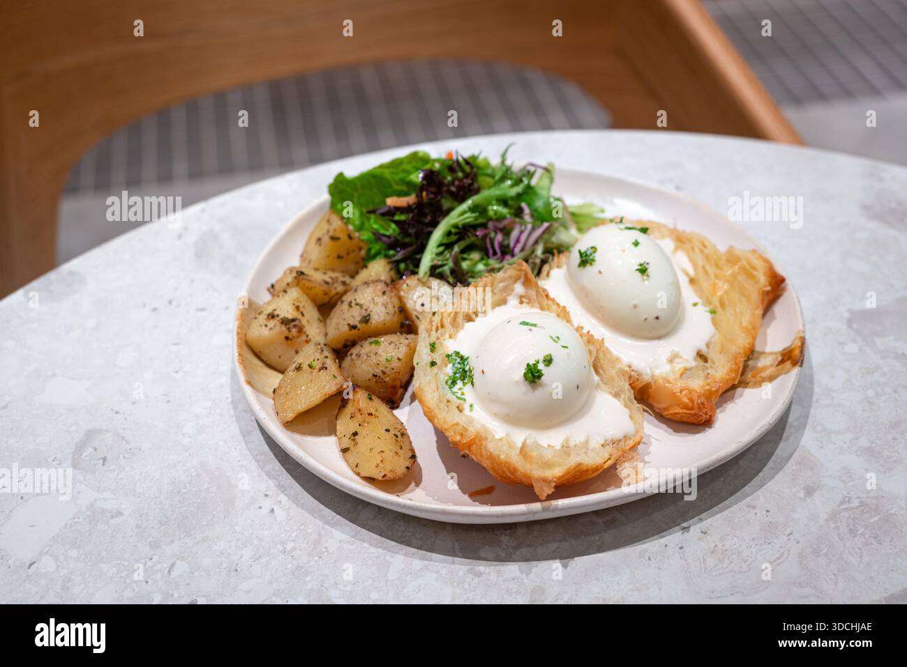 Eggs Benedict dish for breakfast. High angle view. Stock Photo