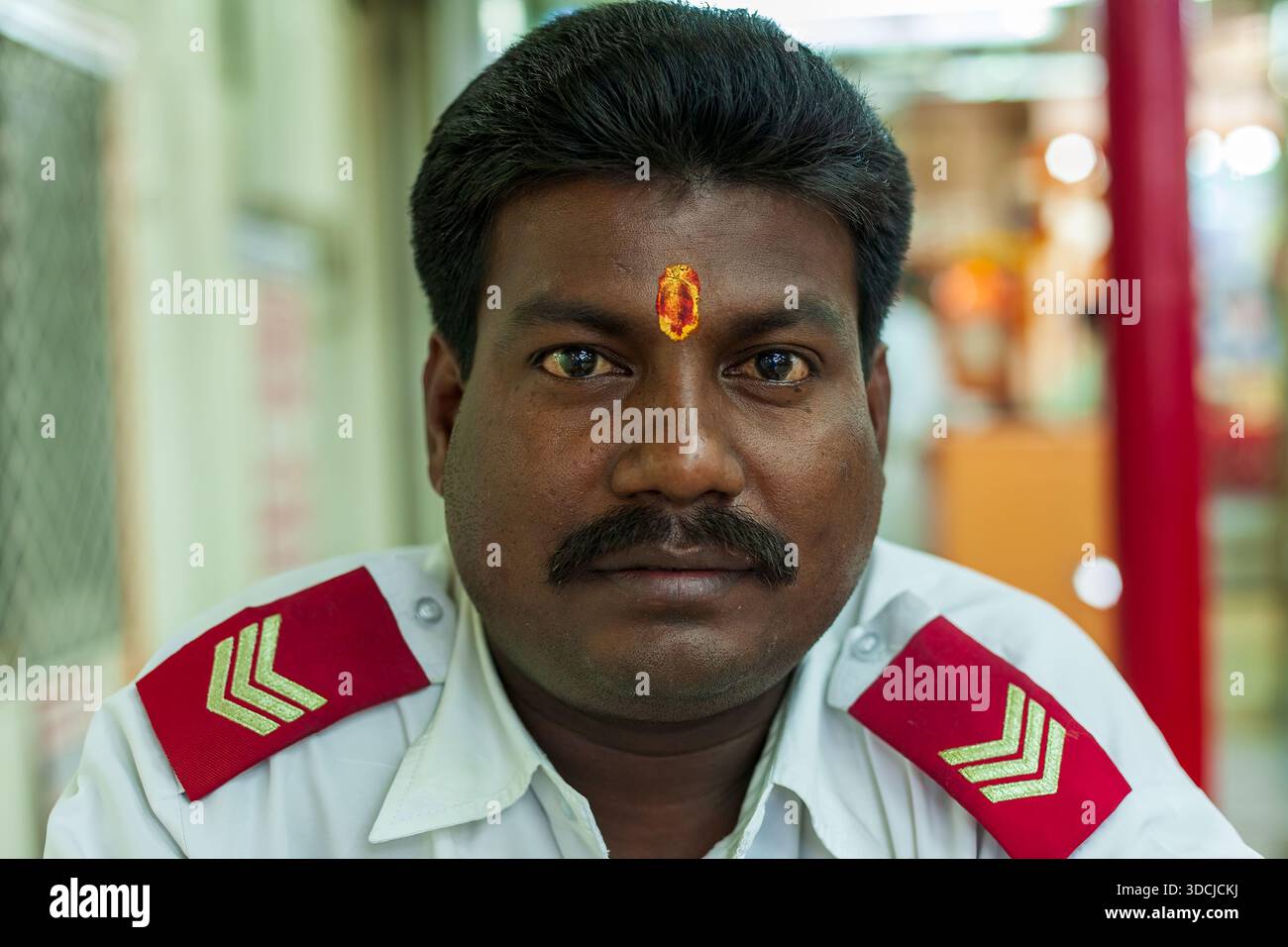 Security guard is looking at the Shiva temple located in Bur Dubai ...