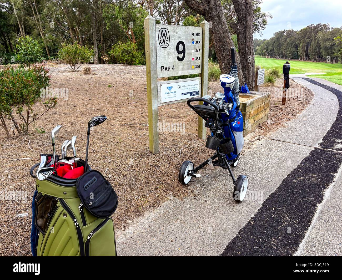 Sydney,Australia, Mona Vale public golf course golf trolleys with bags at the par 4 9th hole on this 18 hole course on Sydney northern beaches - Smartphone Captured Stock Image
