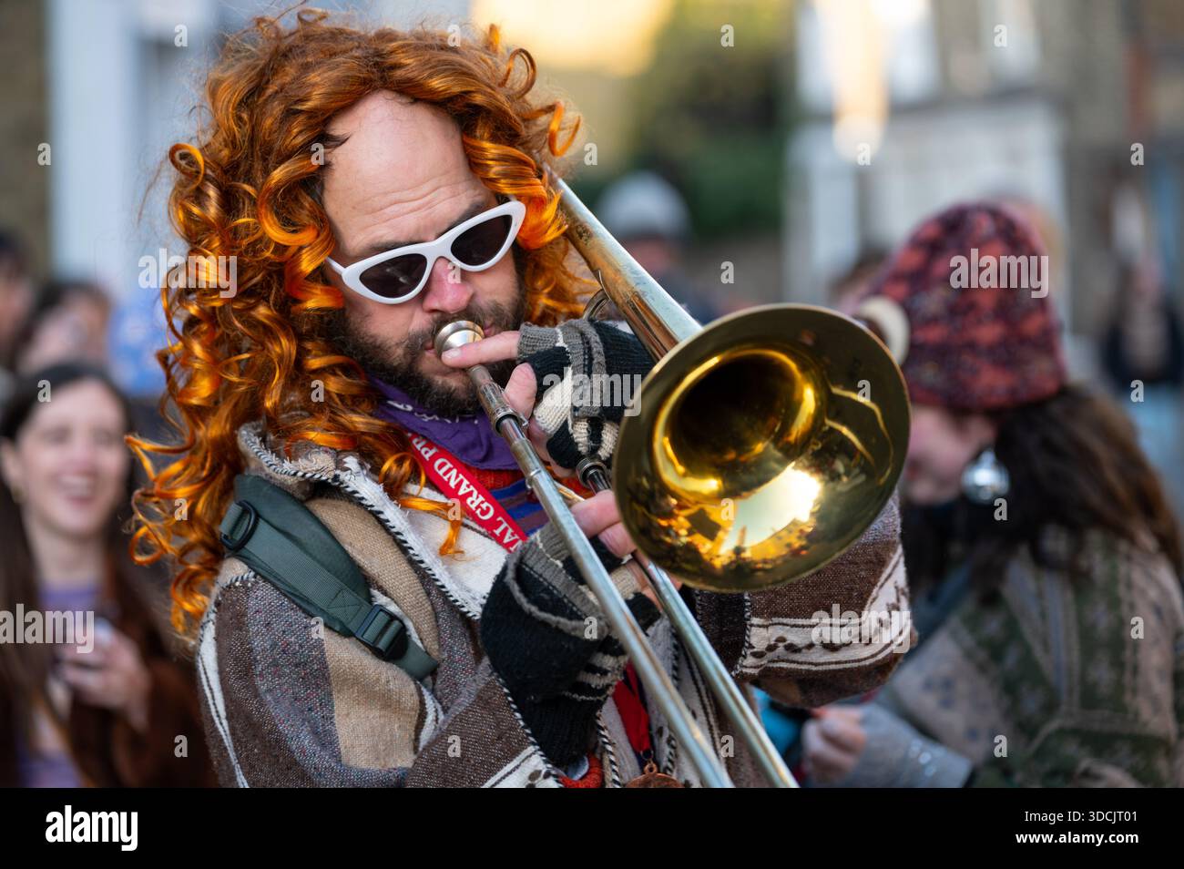 December 14, 2025, London, United Kingdom: A man performs a musical ...