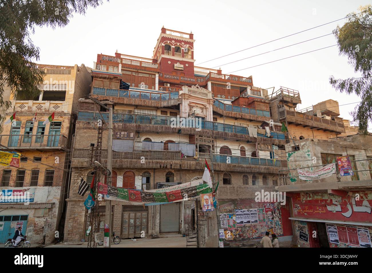 View of a multi-level building with faded colors and intricate ...
