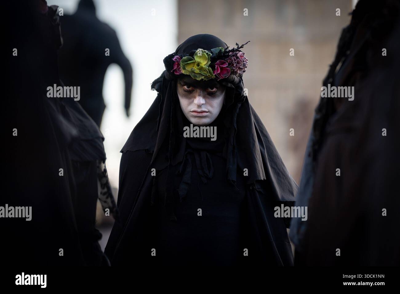 An oil slicker seen in a portrait. Extinction Rebellion Oil Slickers ...