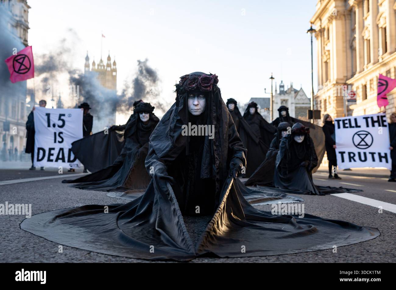 An oil slicker seen in a portrait. Extinction Rebellion Oil Slickers ...