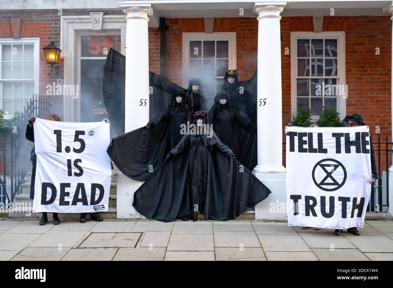 Oil Slickers seen posing in front of 55 Tufton Street. Extinction ...