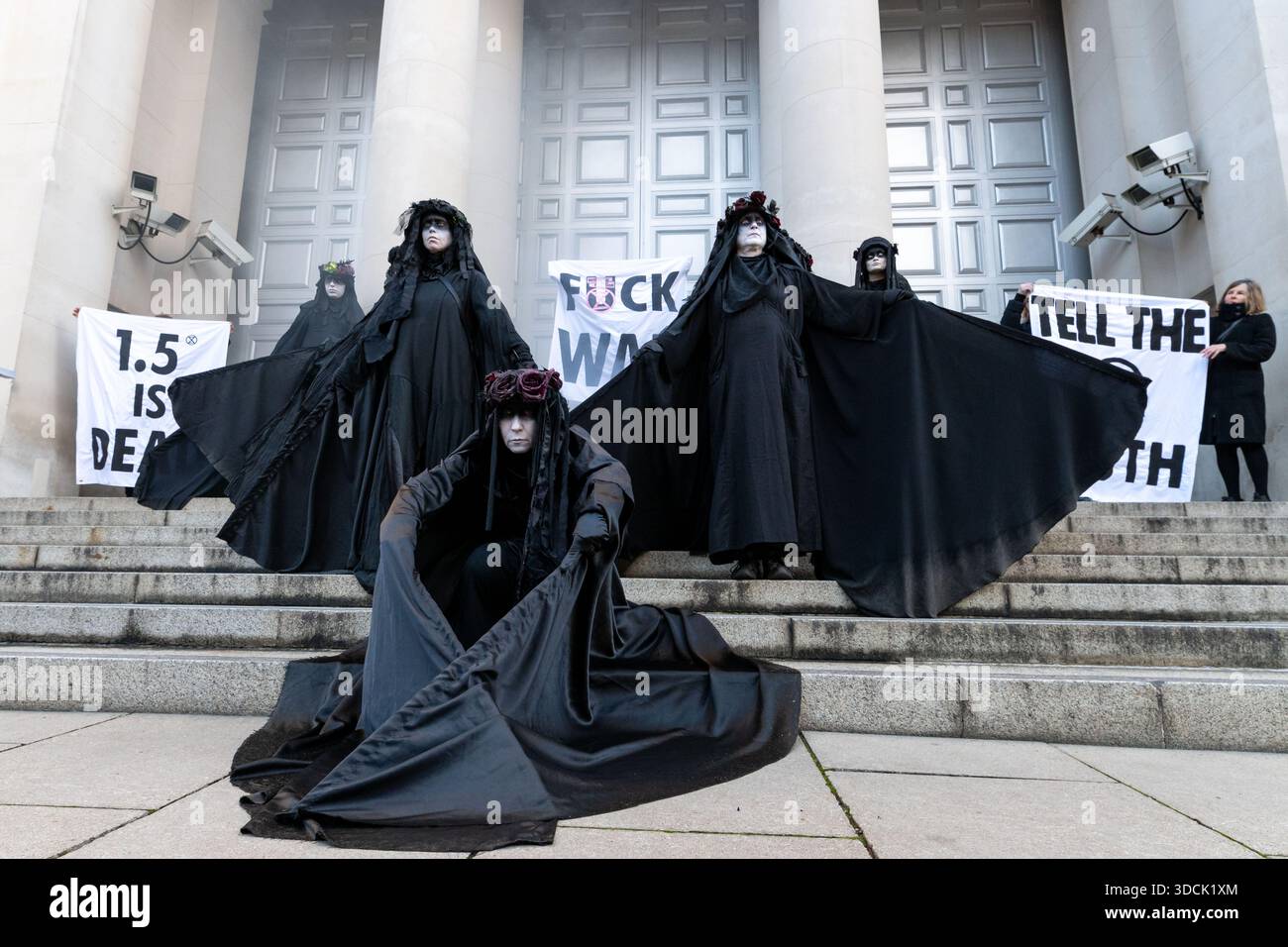 Oil Slickers seen posing in front of the Ministry of Defence ...