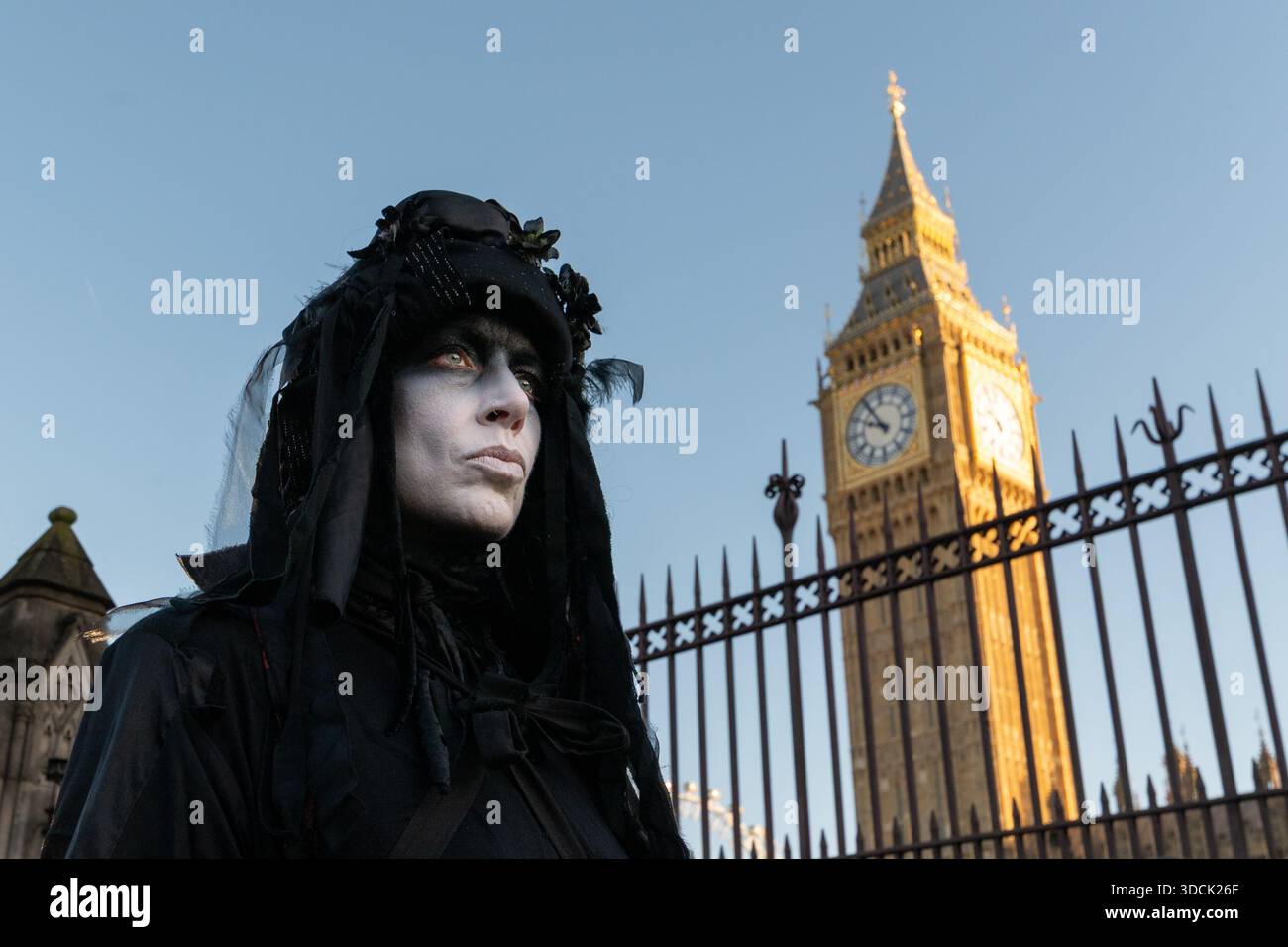 Oil Slicker seen walking past Parliament Extinction Rebellion Oil ...