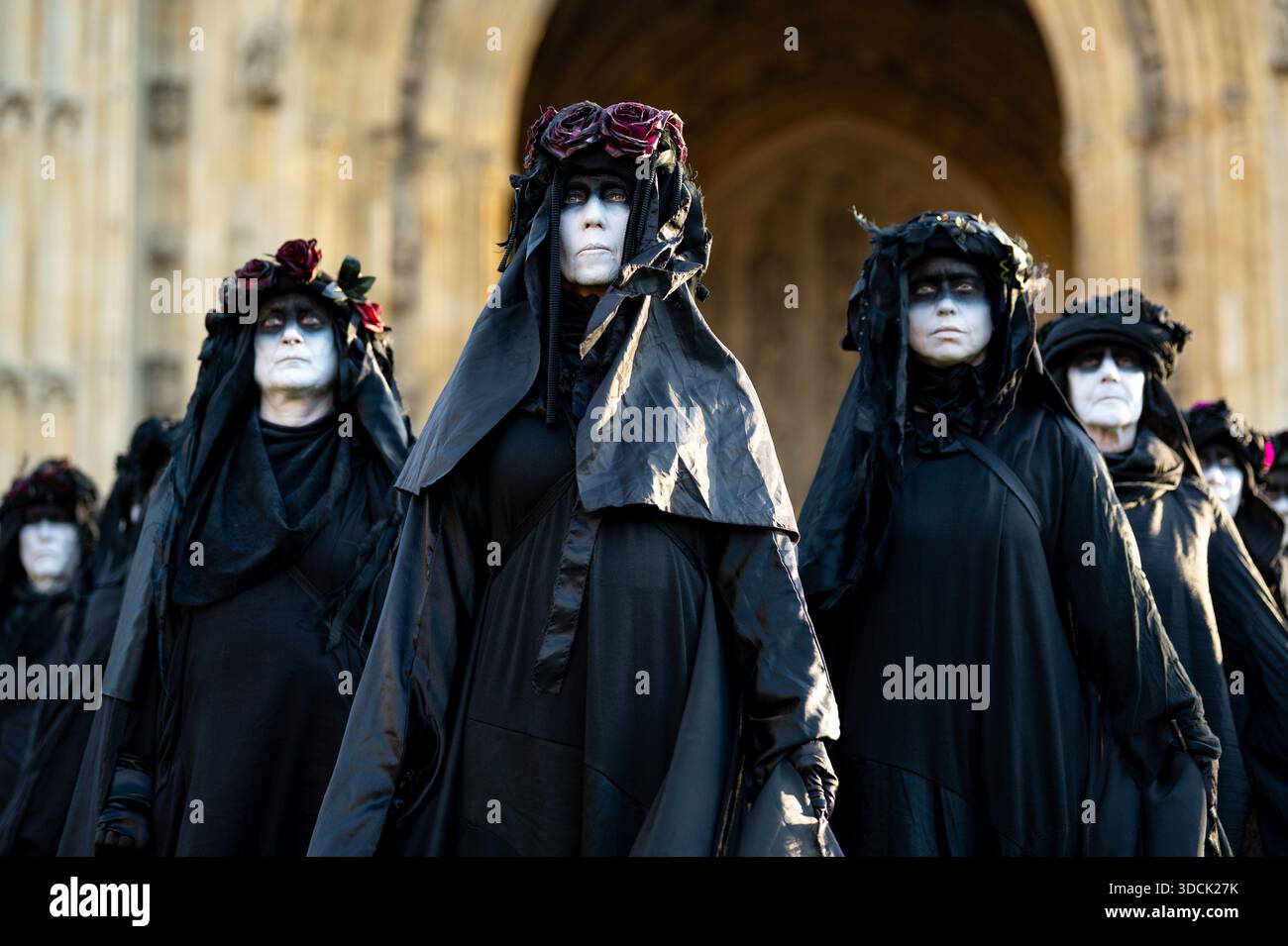 Oil Slickers seen posing in front of Parliament. Extinction Rebellion ...