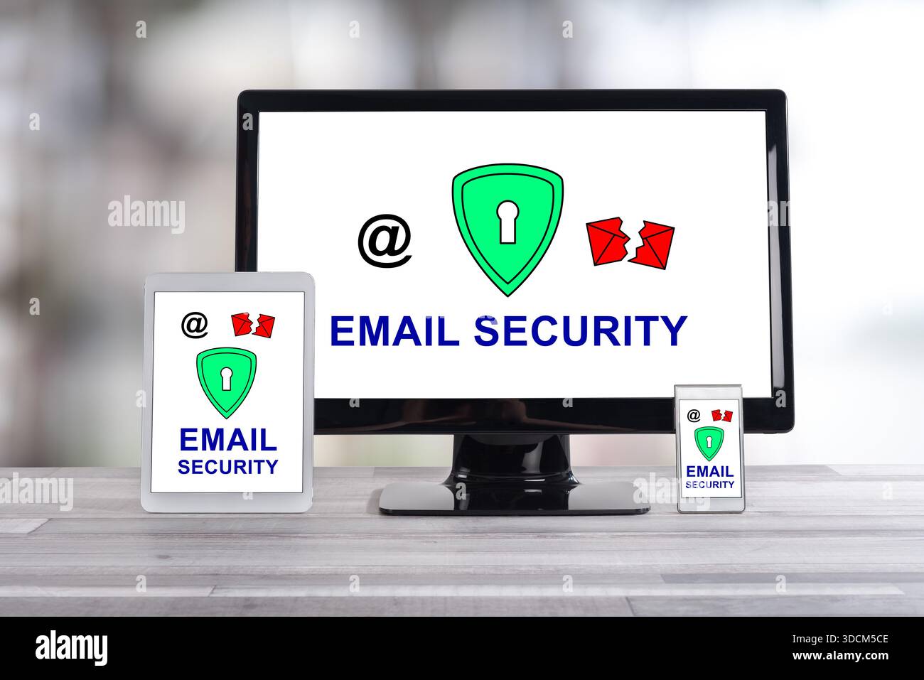 Email security concept shown on different information technology devices Stock Photo
