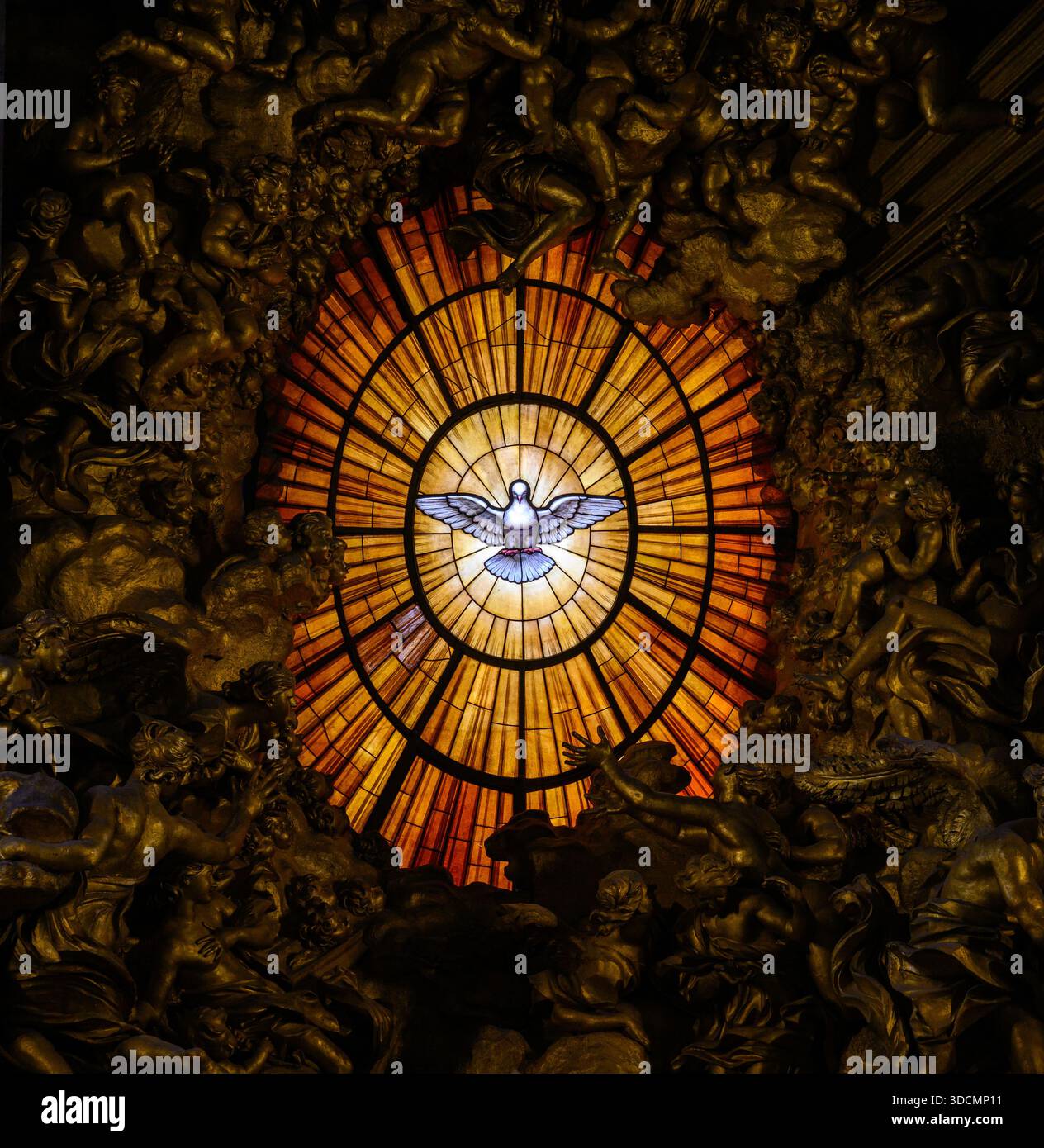 Central stained-glass window depicting the Holy Spirit in St Peter’s Basilica, Vatican, Rome, Italy. - Stock Image