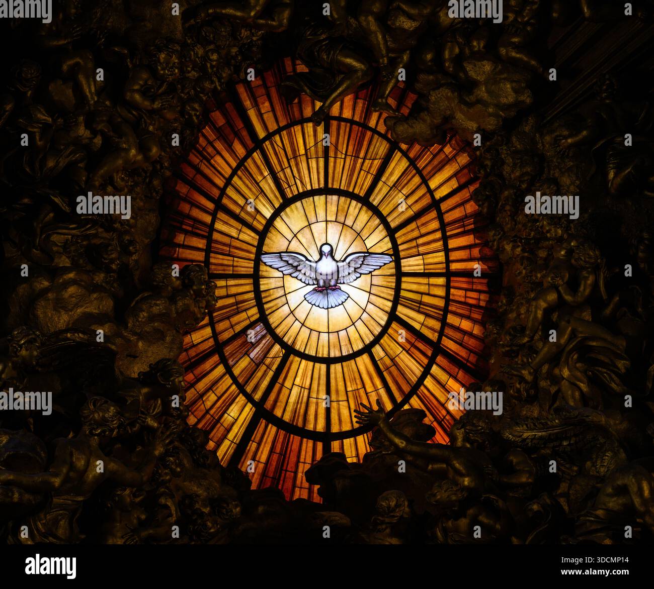 Central stained-glass window depicting the Holy Spirit in St Peter’s Basilica, Vatican, Rome, Italy. - Stock Image