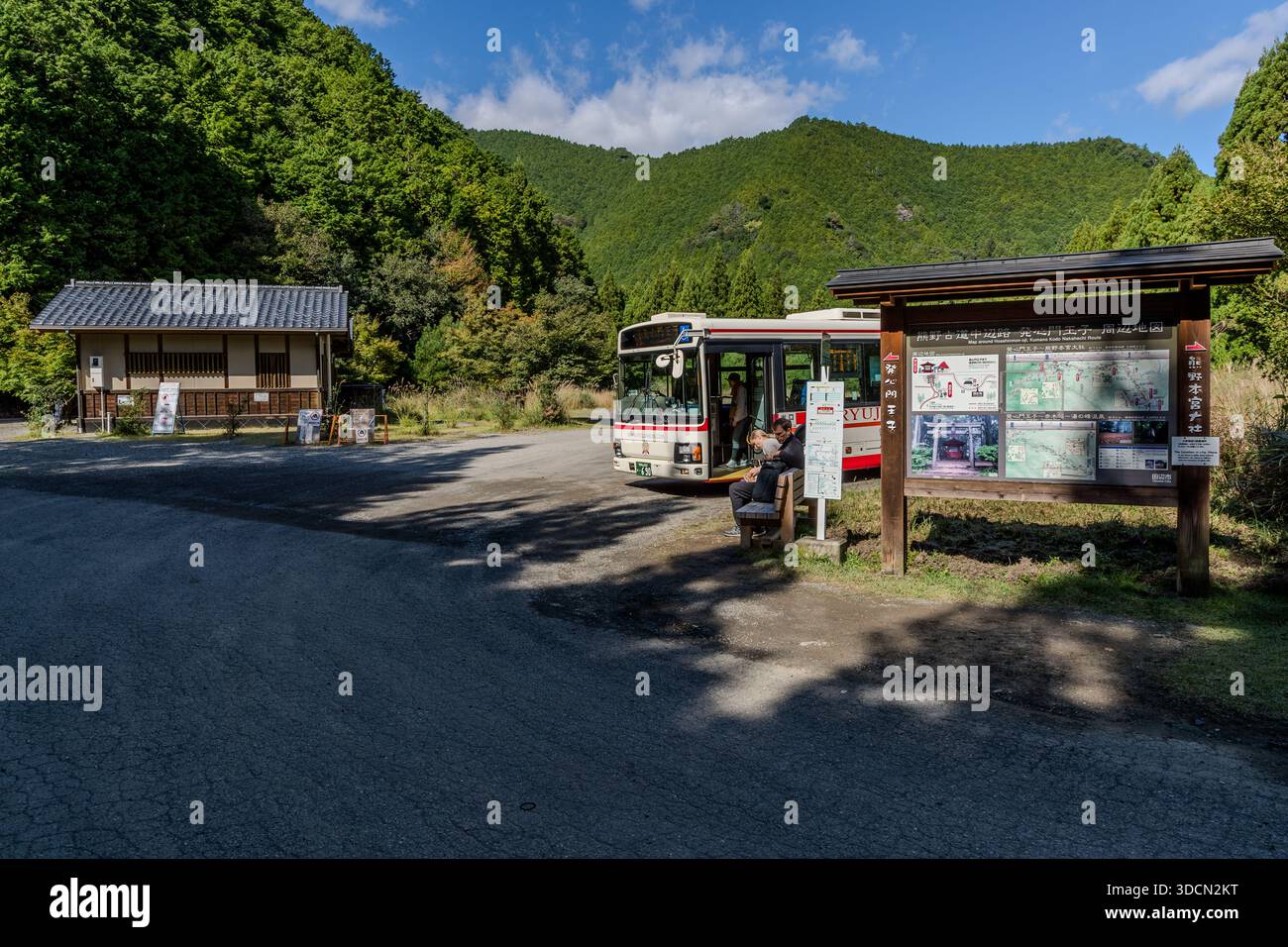A bus stop lies near Hosshinmon-oji on the Kumano Kodo near Tanabe, Wakayama Prefecture, Japan. Pilgrims arrive here by bus from Tanabe. The seven-kilometre hike to Kumano Hongū Taisha Grand Shrine starts at this point. Stock Photo