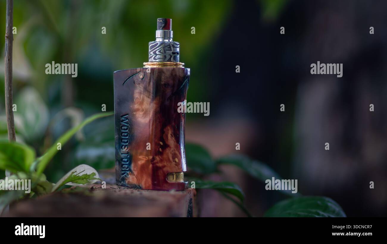 IPOH, MALAYSIA - AUGUST 24, 2016: A custom-made Woodstock stabilized wood  vape mod with 