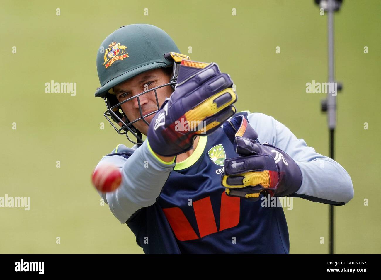 Australia's Alex Carey practices his wicket keeping during a nets ...