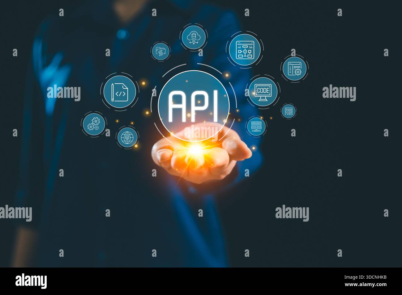 Glowing API interface floating above hand connected digital icon representing application programming interface system integration backend services cl Stock Photo