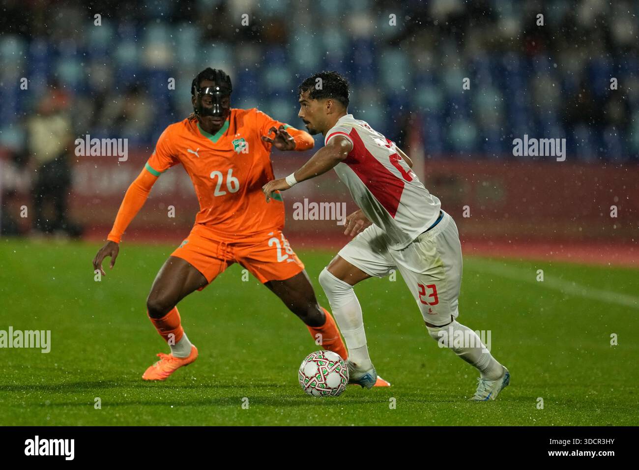 ivory-coast-s-yan-diomande-challenges-mozambique-s-diogo-calila-during