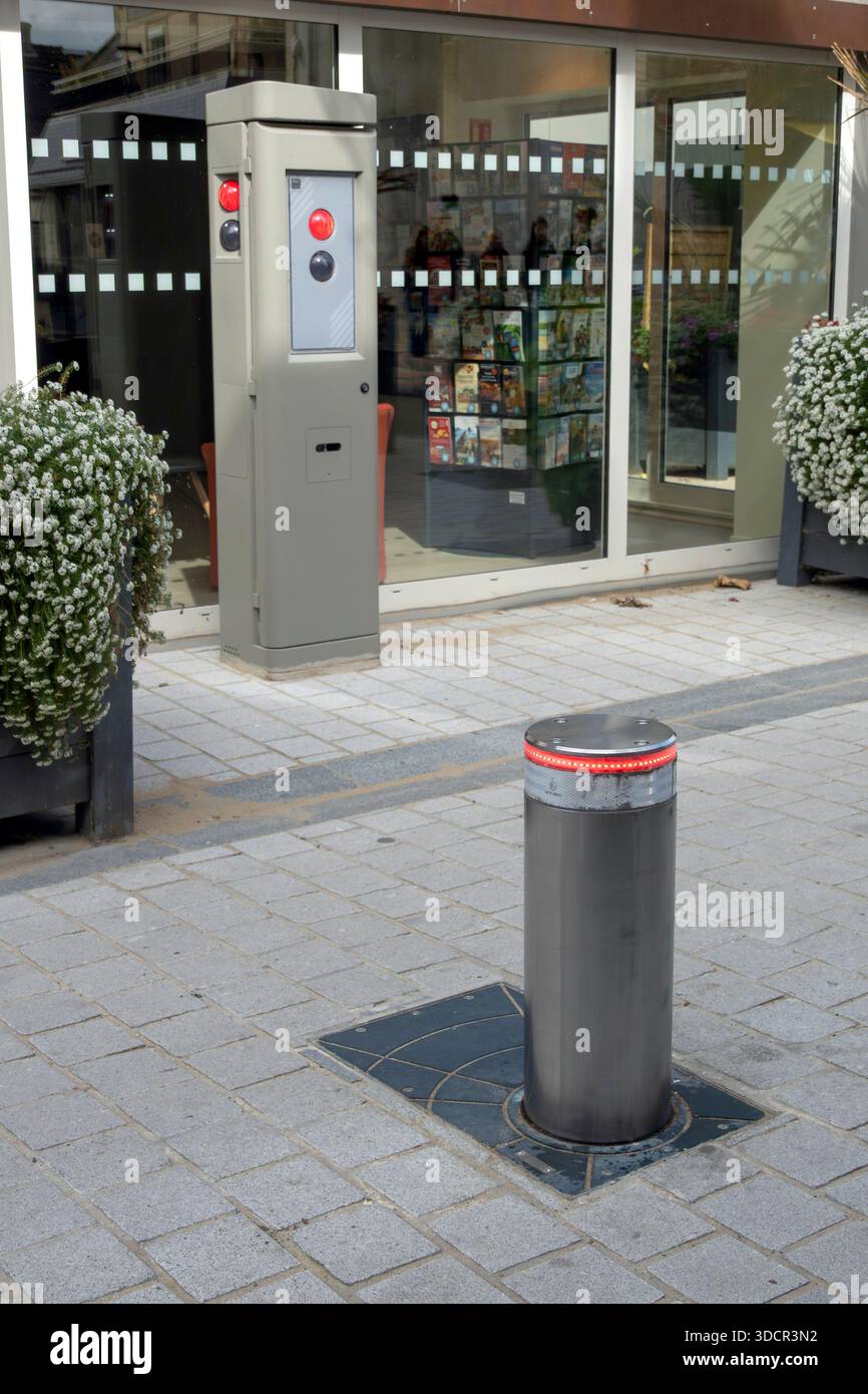 Retractable bollard on street in Normandy, France Stock Photo