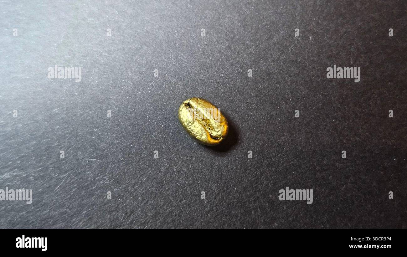 Luxury Gold Coffee Bean on Black Background - Smartphone Captured Stock Image