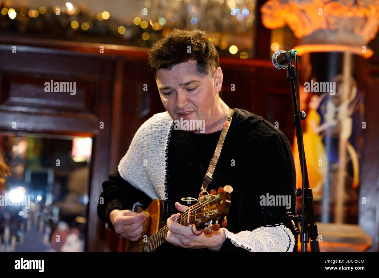 Danny O'Donoghue takes part in the annual Christmas Eve busk on Grafton ...
