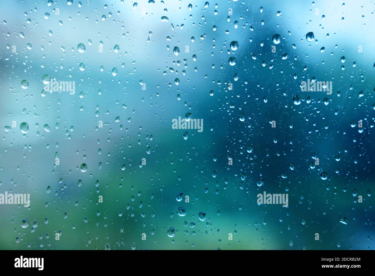 Glass surface with water drops, closeup view Stock Photo