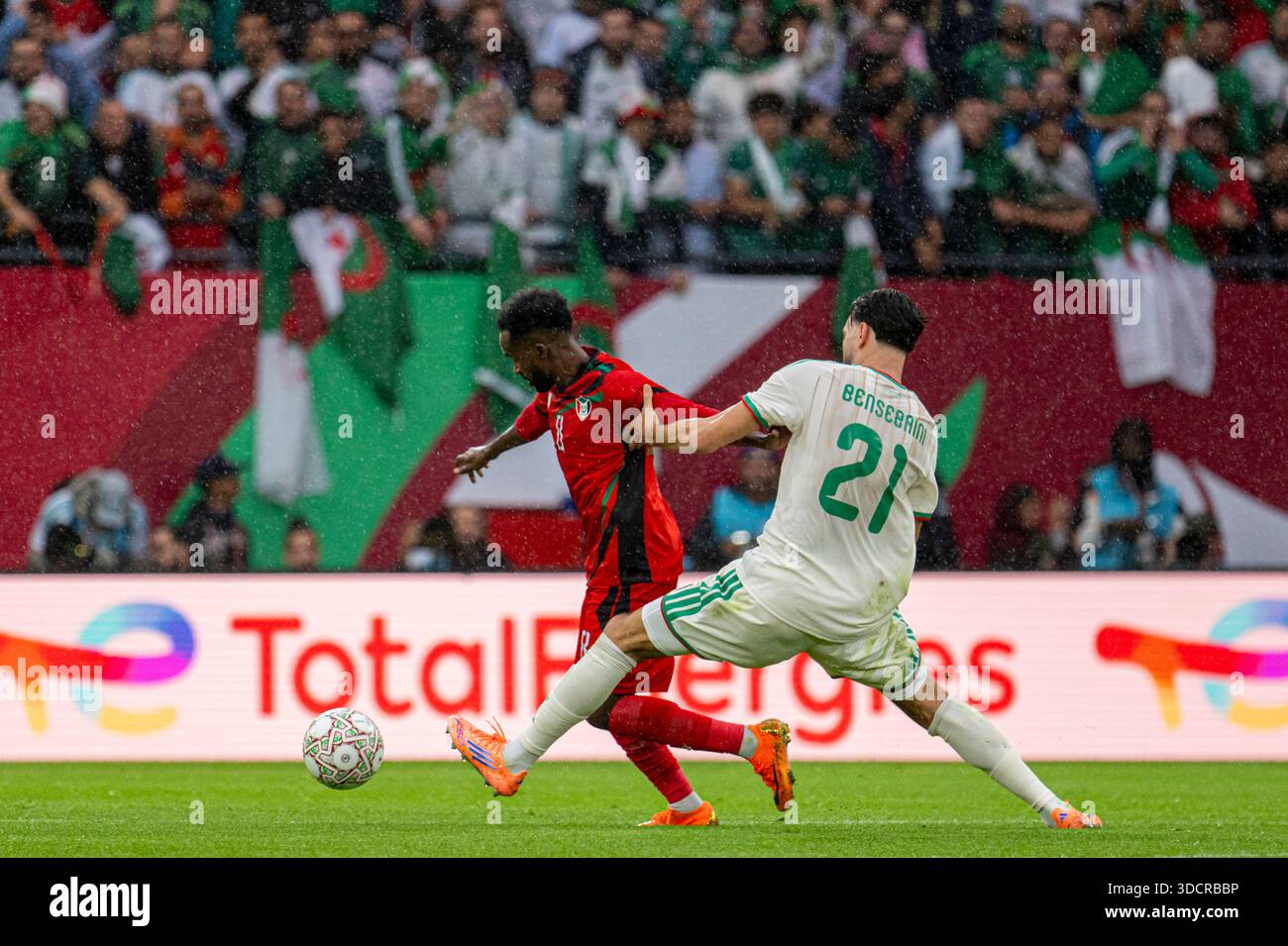 abdel-raouf-of-sudan-fights-for-the-ball-with-ramy-bensebaini-of