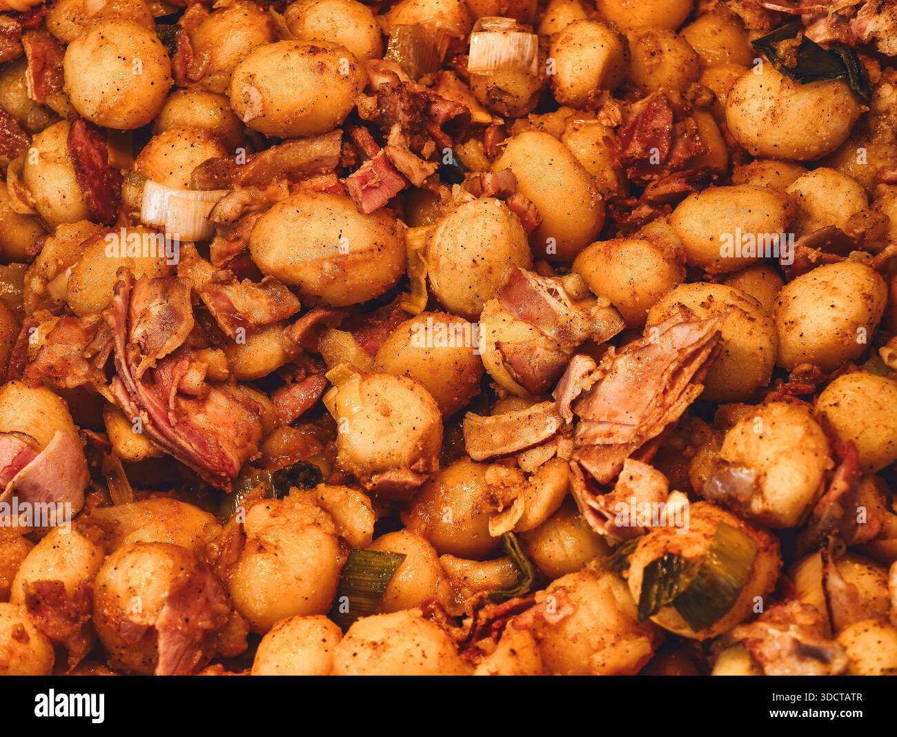 Gnocchi with Bacon and Leeks Italian Pasta Dish Cooking in Skillet Closeup Modern Lifestyle Food Background Stock Photo