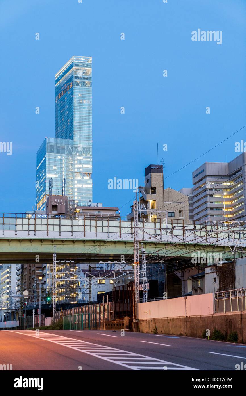 Main road and Osaka Loop railway line leading towards the Abeno Harukas ...