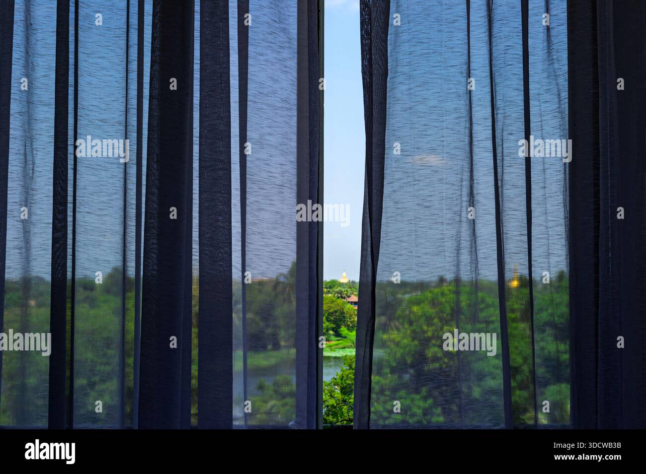 The Shwedagon Pagoda officially named Shwedagon Zedi Daw and also known as the Great Dagon Pagoda, is a gilded stupa located in Yangon Myanmar Stock Photo