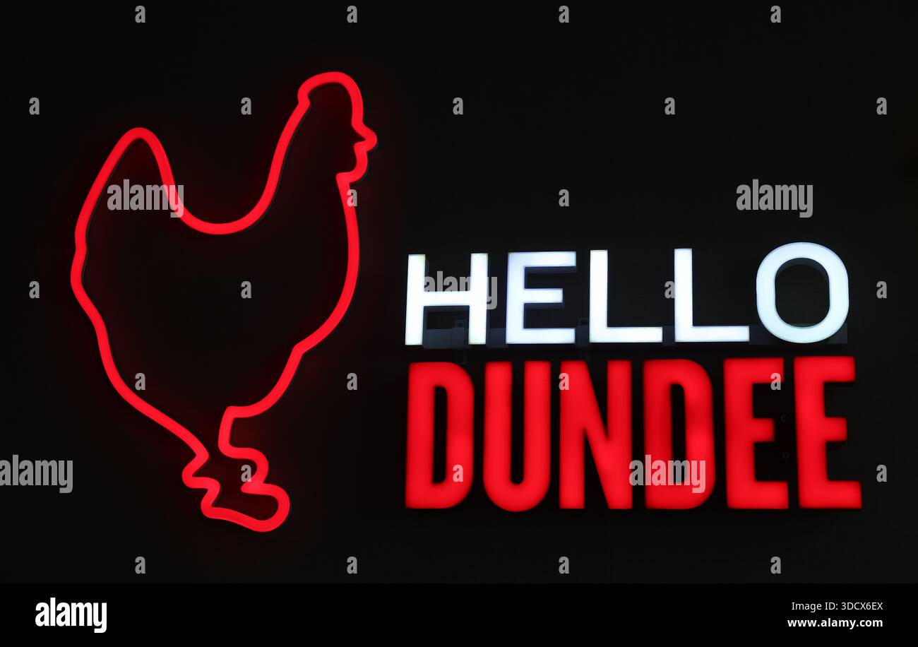 Illuminated “Hello Dundee” neon sign featuring the KFC chicken logo at a Kentucky Fried Chicken restaurant 32 Murraygate, Dundee, DD1 2AZ Stock Photo