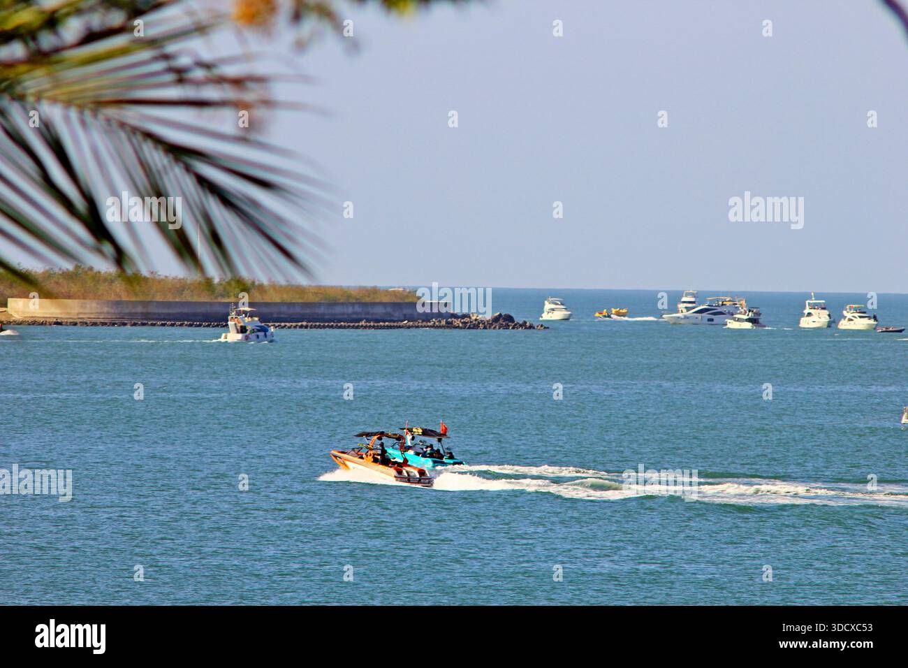 tourists-enjoy-the-warm-sunshine-on-the-beach-during-winter-in-sanya