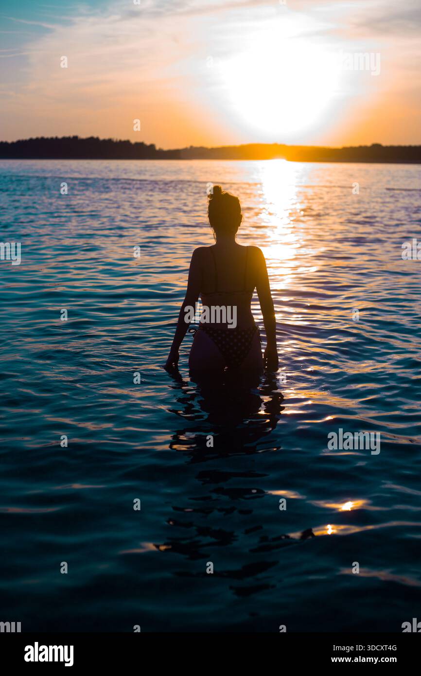 Woman in bikini standing sea bikini hi-res stock photography and images ...