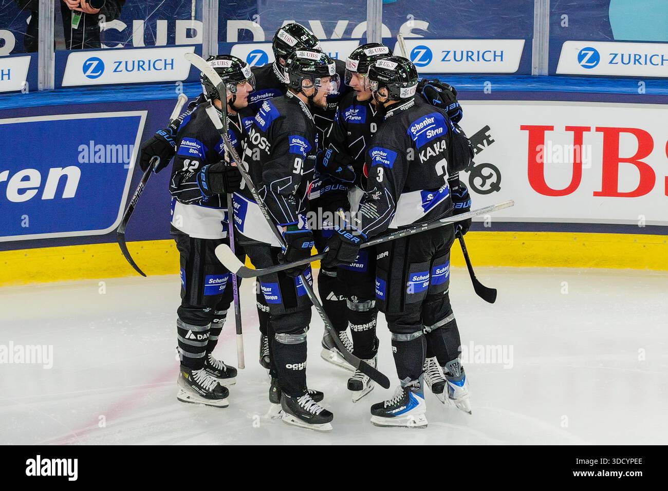 DAVOS, SWITZERLAND - DECEMBER 26: Marcus Sorensen of Fribourg 2nd R)  celebrates for his goal during the Spengler Cup Davos match between HC  Fribourg-Gotteron and HC Sparta Praha at Zondacrypto-Arena on December
