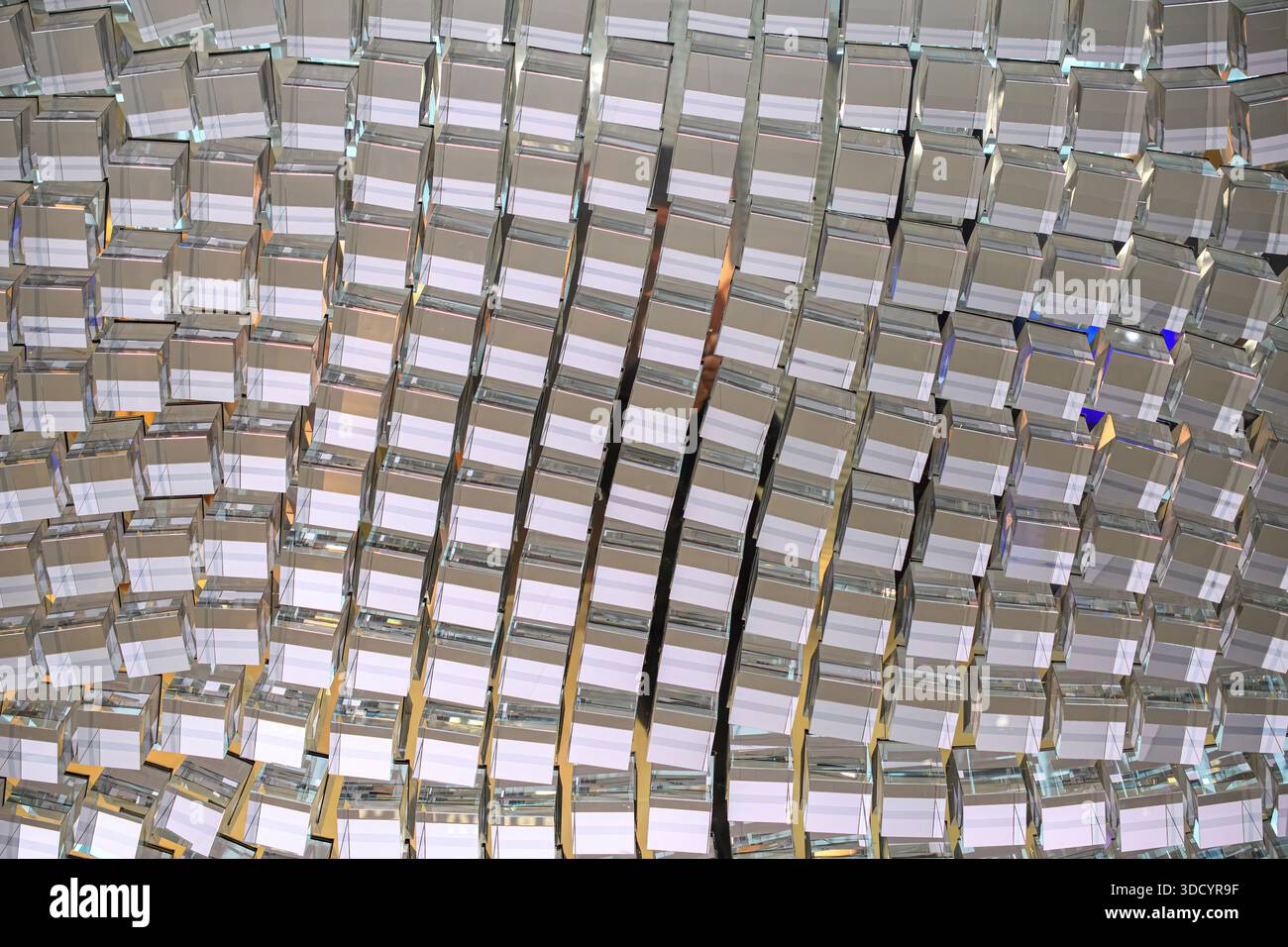 Close-up of geometric crystal elements forming a reflective grid pattern. Stock Photo