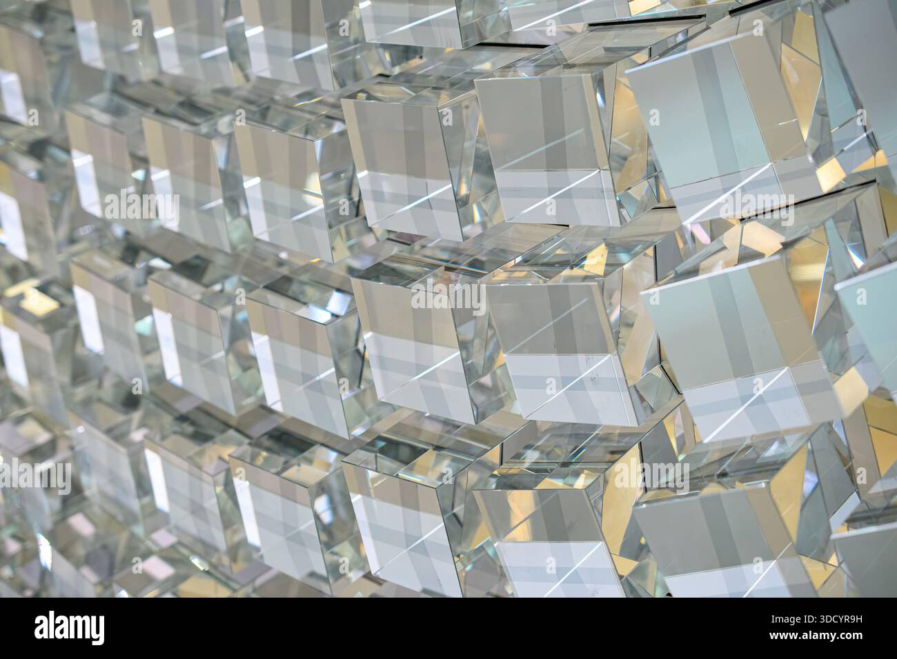 Close-up of geometric crystal elements forming a reflective grid pattern. Stock Photo