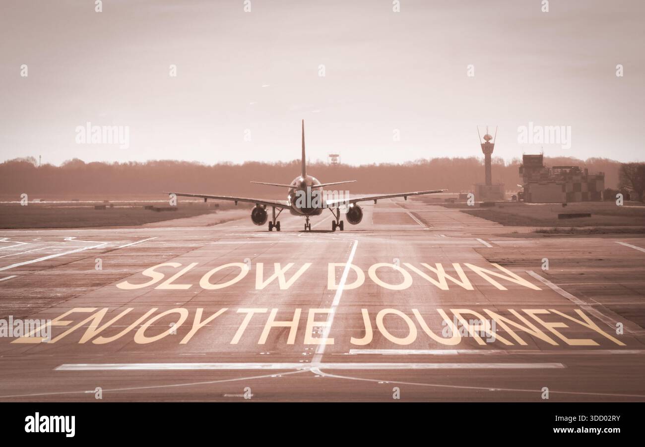 Airplane taxiing runway with slow down enjoy journey concept Stock Photo