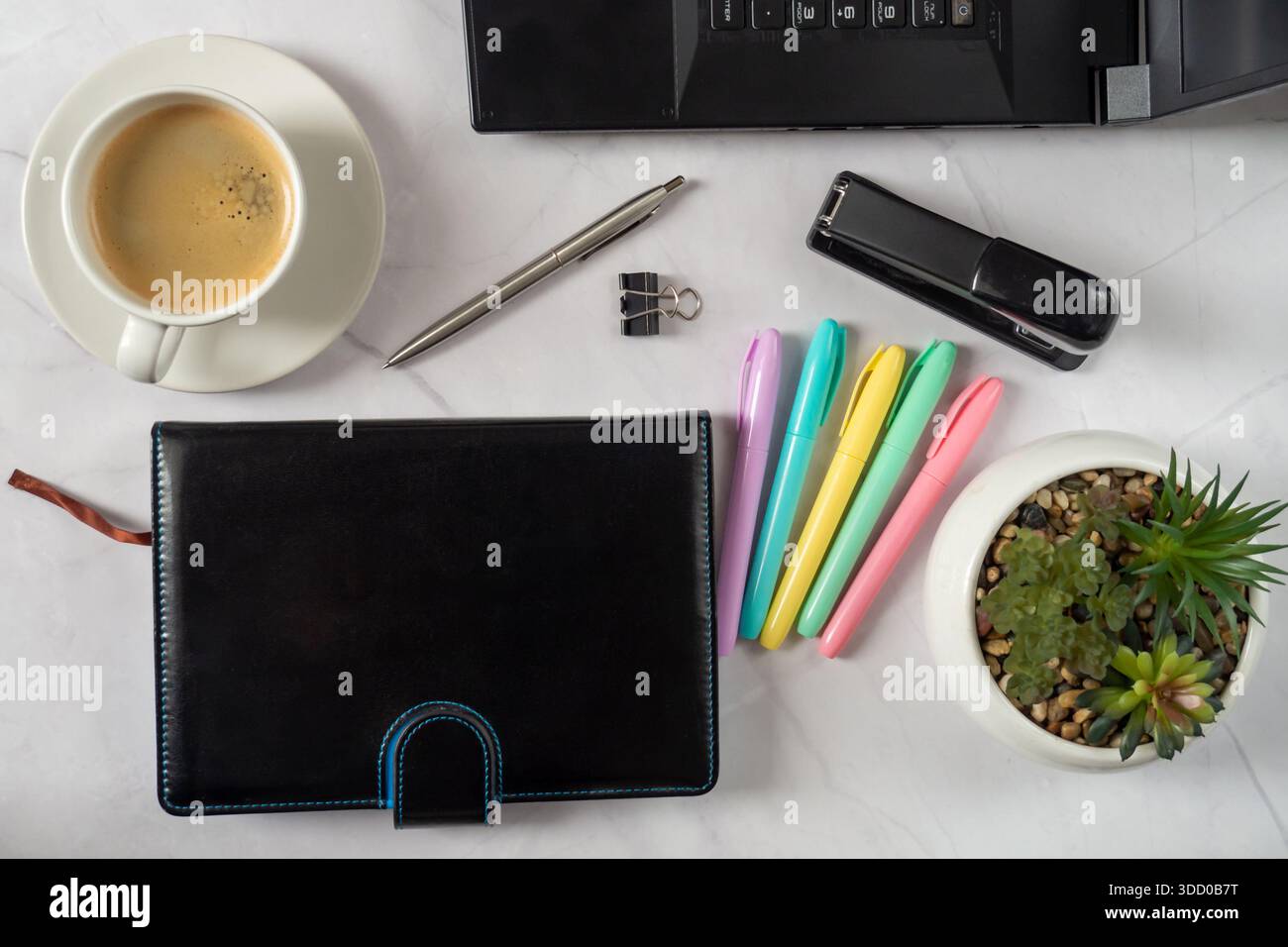 Charming Workspace Setup, Artistic Desk Arrangement Featuring Essentials Stock Photo
