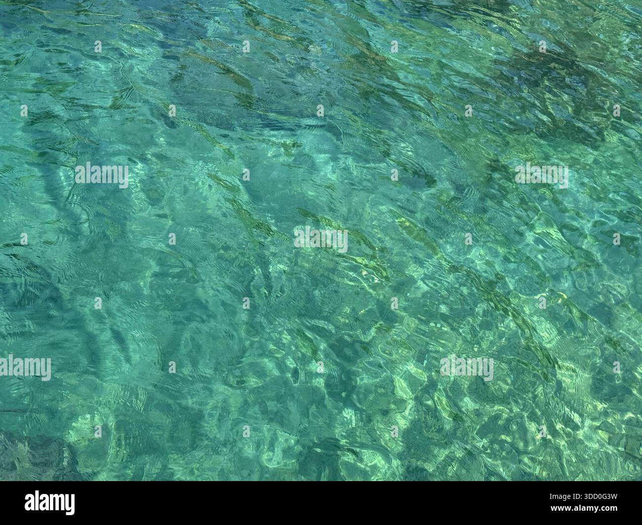 Ocean water clear emerald rippled surface Stock Photo