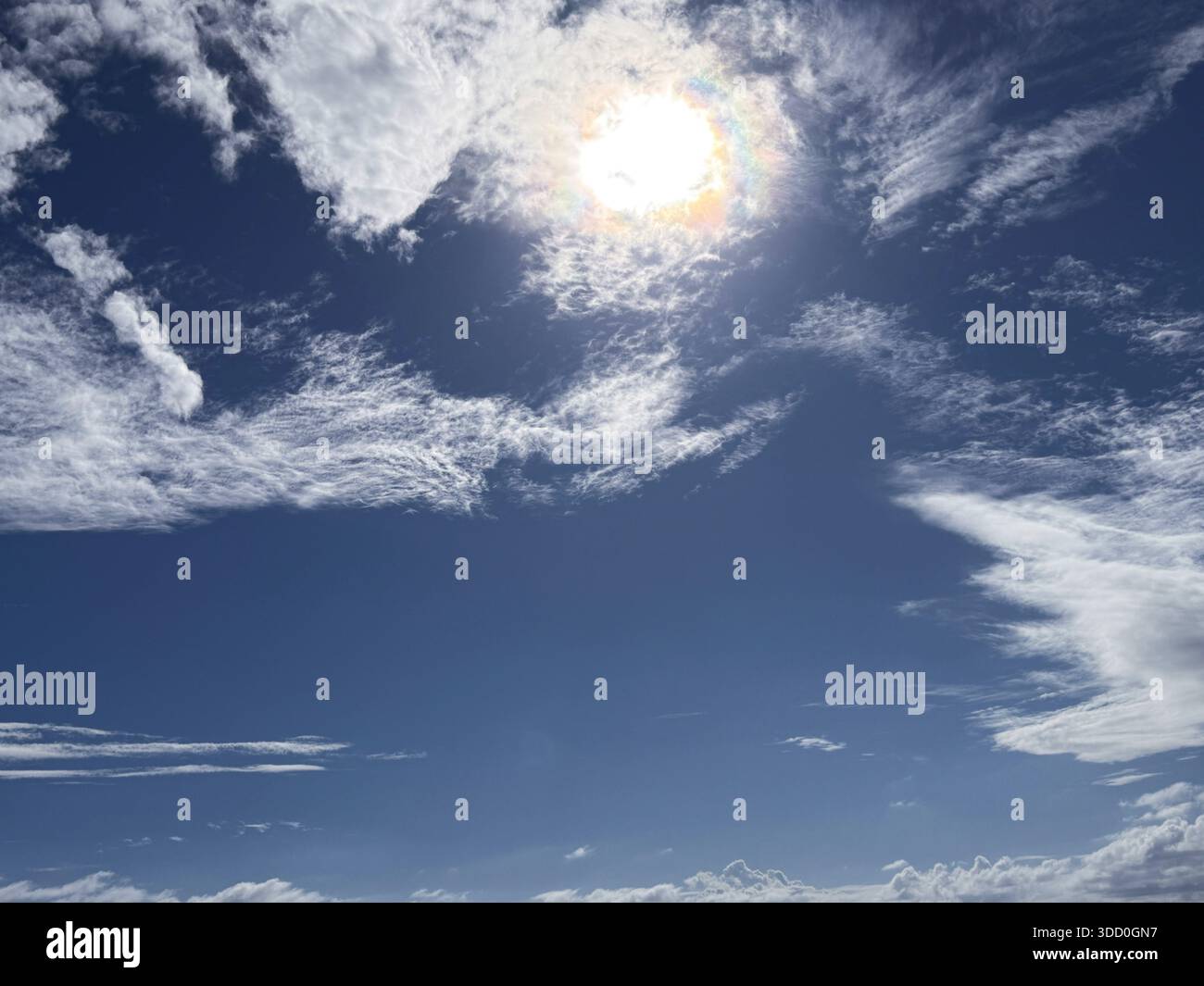 Blue sky, clouds, sun, sunshine, sunlight Stock Photo