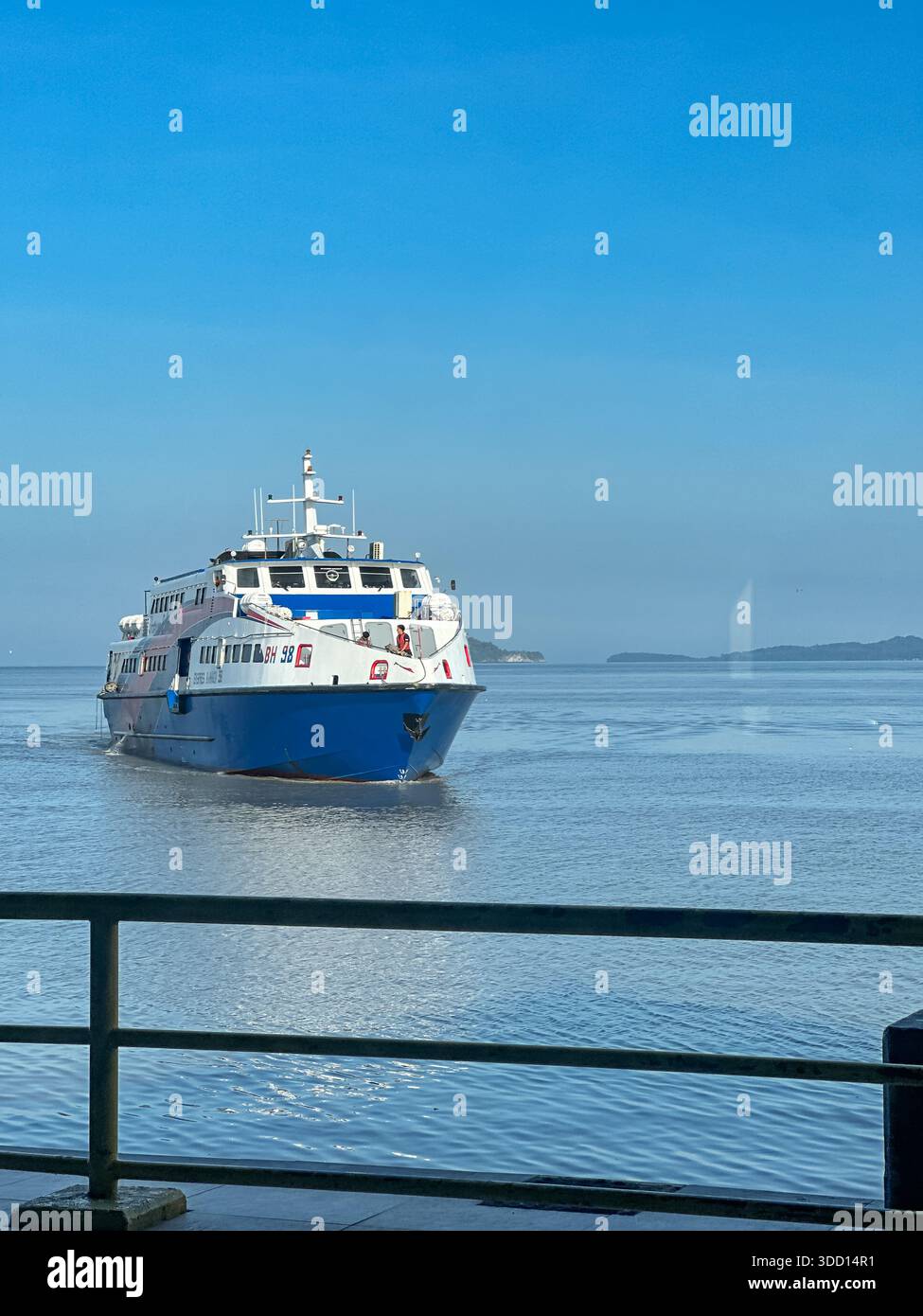 Perlis, Malaysia, December 3, 2025: A large white and blue passenger ...