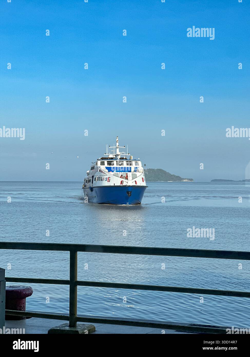 Perlis, Malaysia, December 3, 2025: A large white and blue passenger ...